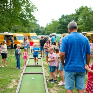 Families enjoying a mini golf event at Curtis Hixon Waterfront Park