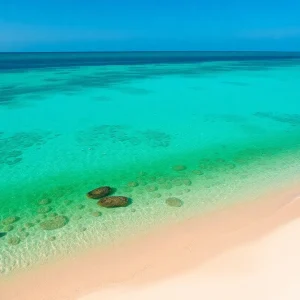 A beautiful view of Florida's Gulf Coast with sandy beaches and blue water.